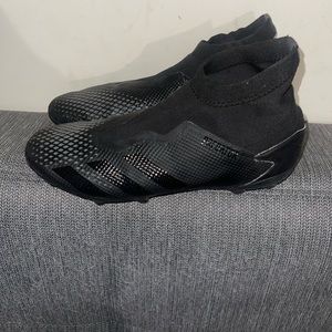 Men football cleats~adida size 11.5. No box and in mint condition.